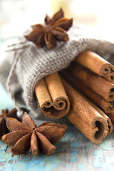 Cinnamon and anise in a small burlap sack