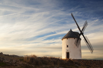 Old windmill at the sunset