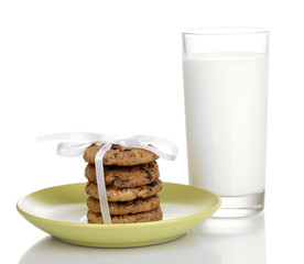 Glass of milk and cookies isolated on white