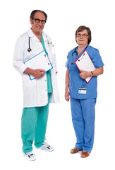 Two medical professionals standing together