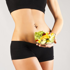 Sports pres young girl. Salad
