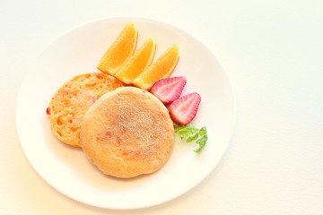 English muffin with fruit breakfast