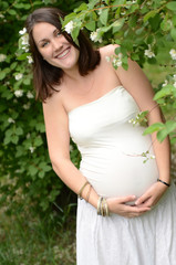 Fototapeta na wymiar Pregnant smilling woman