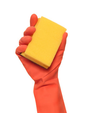 Guante de limpieza sujetando una esponja,art&iacute;culo de limpieza.