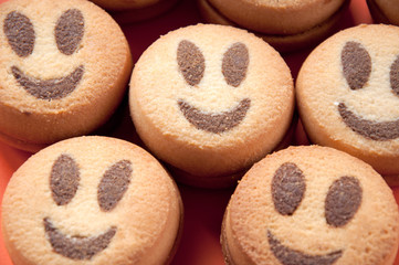 Close-up of smiling cookies, studio shot