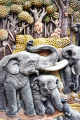 Carved elephant herd