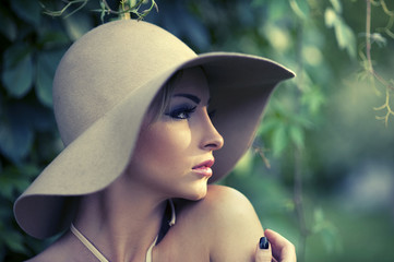 portrait of a beautiful girl with a hat