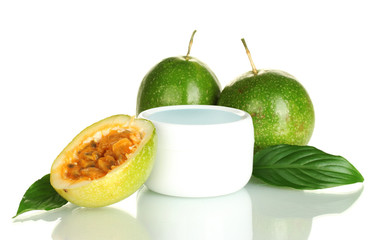 green passion fruit with cosmetic cream isolated