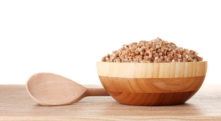 Boiled buckwheat in a wooden bowl