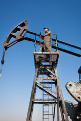 Oil company worker on the well