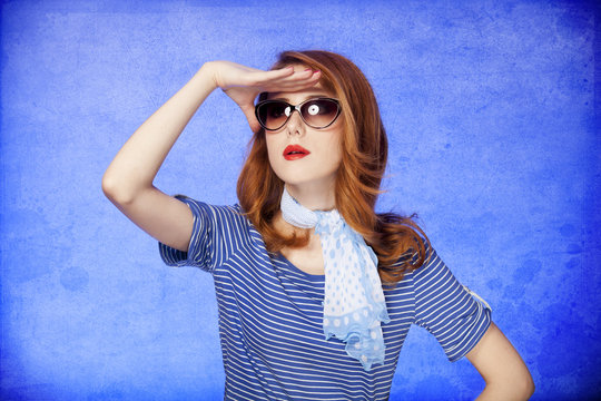 American redhead girl in sunglasses.