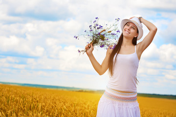 girl's portrait  with wild flowers
