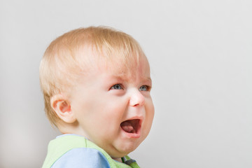 Boy looking up into space screaming