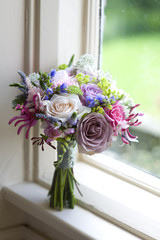 wedding bouquet near a window