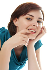 Fototapeta premium young girl on white background - thinking about something