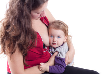 Little girl eating milk