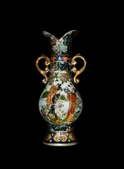 Chinese antique porcelain vase isolated on black