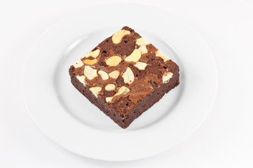 close up shot of sweet delicious brownies with beans.