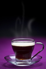 Coffee cup on a purple background
