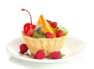 sweet cake with fruits on plate isolated on white