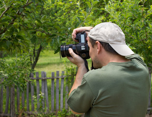 Obraz premium photographer taking photo