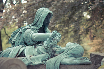 Cemetery Pere Lachaise in Paris, graves and sculptures