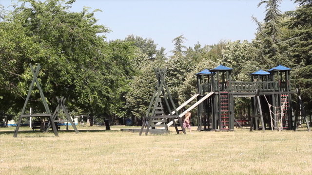 little girl running on playground