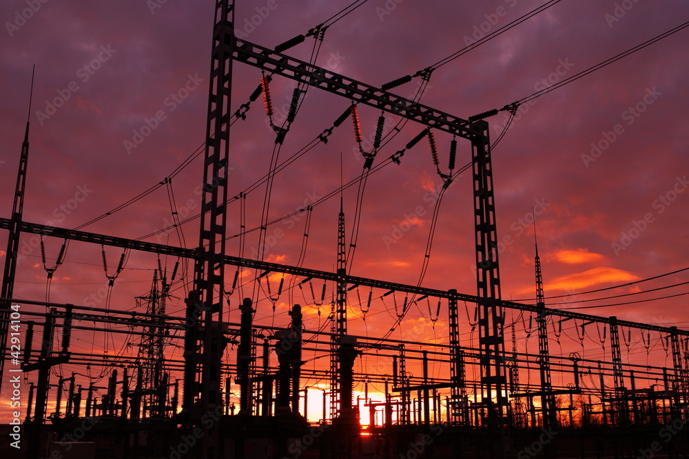 Wall mural Electrical substation on the sunset background