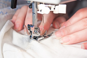 Hand sewing on a machine