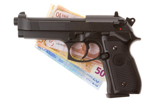 Semi-automatic gun and money isolated