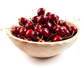 Cherries in a wooden bowl