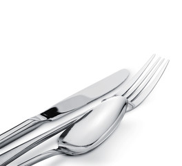 Fork spoon and knife isolated on white background