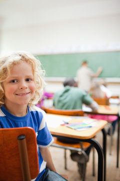 Elementary school student not paying attention to teacher