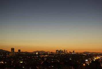 Fototapeta na wymiar Sunrise with heat haze of Downtown Los Angeles skyline