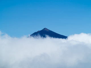 Fototapeta premium Peak of Teide in clouds