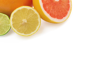 Image of a fresh whole lime, lemon and orange isolated on white