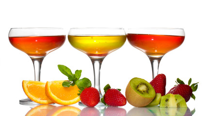 fruit jelly in glasses and fruits isolated on white