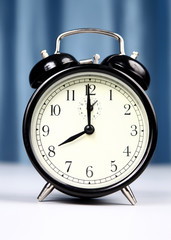 Alarm clock on a light background