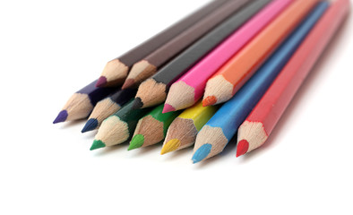 it is a lot of color pencils on a white background