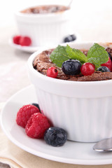 chocolate souffle with berries fruits