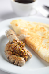 Sausages with omelet