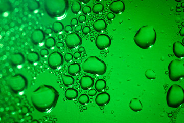 Refreshing green watery background (color toned image; shallow D