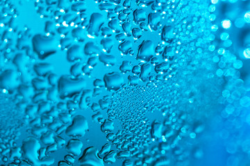 Refreshing blue watery background (color toned image; shallow DO