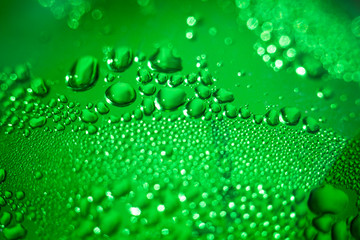 Refreshing green watery background (color toned image; shallow D