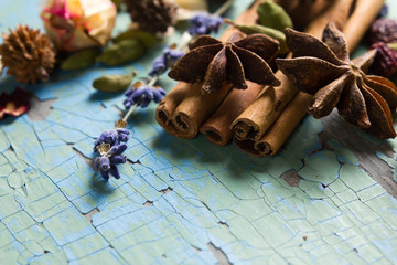 Herbal aroma composition of spices on the vintage wooden surface