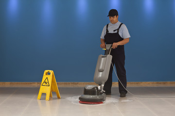 cleaning floor with machine