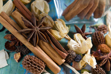 Spices and dried flowers on the vintage wooden surface