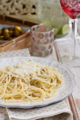 Green olives, thyme and parmesan cheese pasta