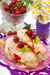meringue cakes with almond cream and cherry