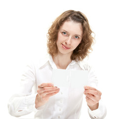 Young woman showing blank puzzles